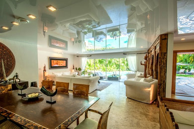 Inspiration for a large eclectic formal and open concept porcelain tile and brown floor living room remodel in Miami with beige walls, no fireplace and no tv