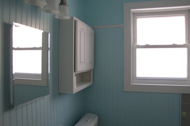 Example of a classic bathroom design in Other