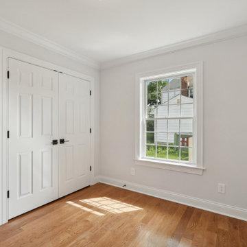 Bedroom with Double Closet and Window