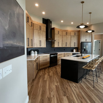 Angled Kitchen Design with Slab Style Cabinets in Pecan Stain