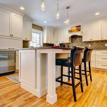 White Shaker Beauty featuring Candlelight Cabinetry