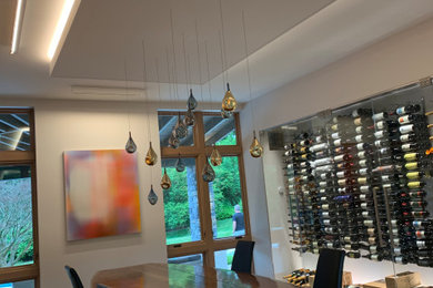 Inspiration for a small contemporary ceramic tile wine cellar remodel in Philadelphia