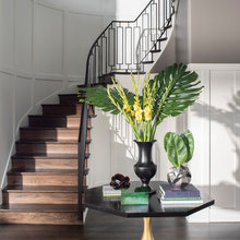 temp stairs holding book
