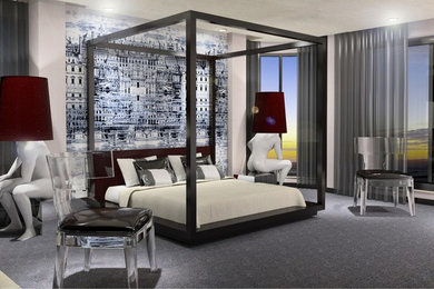 Imagen de dormitorio principal contemporáneo grande con paredes multicolor y moqueta