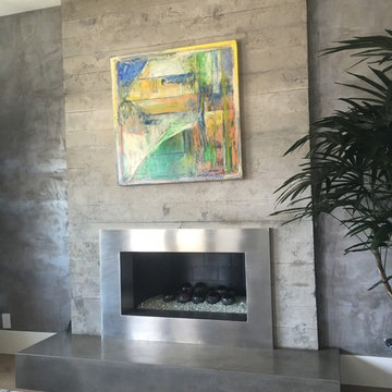 Concrete board form veneer tile fireplaces surround and concrete hearth