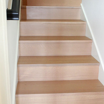 Refinish existing floors matching new floor installed.