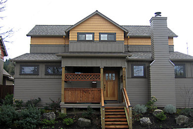 Large trendy three-story exterior home photo in Portland