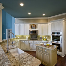 granite w/ backsplash & white cabinets