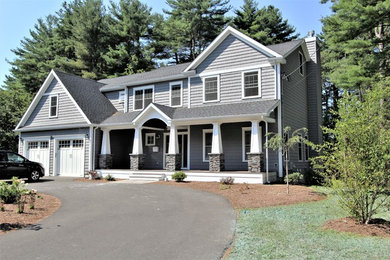 Inspiration for a craftsman blue two-story wood house exterior remodel in Other