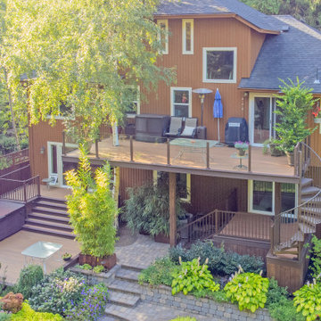 Multilevel Deck with Spiral Staircase & Glass Handrail