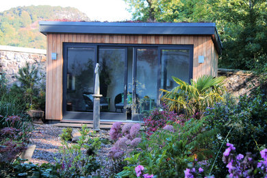 Bespoke Garden Room with living sedum roof, sliding doors and sidescreens