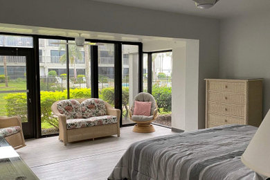 Example of a beach style bedroom design in Other