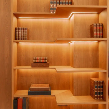 Bibliothèque sur mesure en merisier