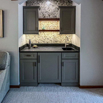 Wet Bar with Undercounter Beverage Center with Leathered Granite Countertop