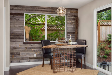 Inspiration for a mid-sized contemporary dark wood floor and brown floor kitchen/dining room combo remodel in Seattle with brown walls and no fireplace