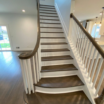Two-Tone Staircase with Flared Bottom Step