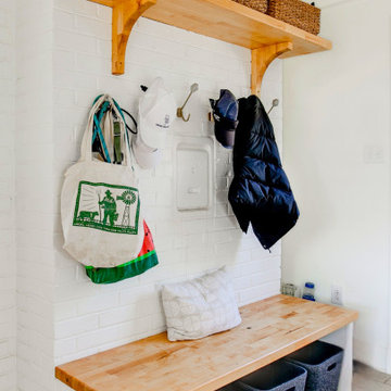 Organized Mudroom with Custom Bench and Storage