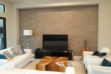 Beach style living room photo in Miami
