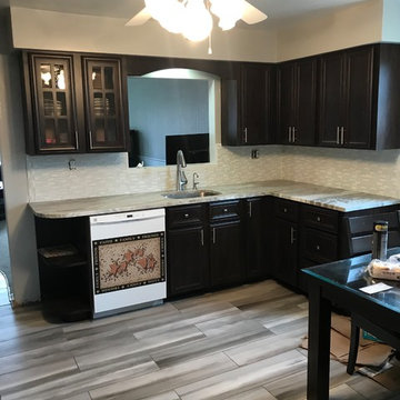 cabinet refacing-------chocolate and new granite and splash