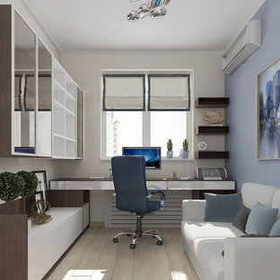 Photo of a small modern study in New York with multi-coloured walls.