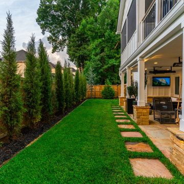 Covered Backyard Patio with Stepping-Stone Lawn Path