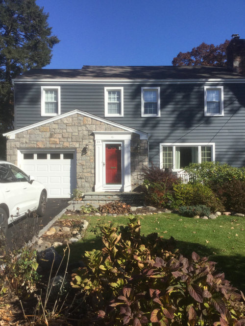 Ideas on replacing damaged vinyl siding with different material.