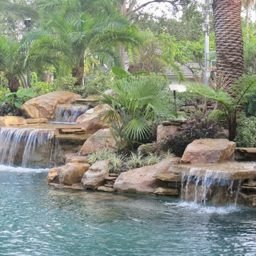Tropical gardens and pool waterfalls in Miami