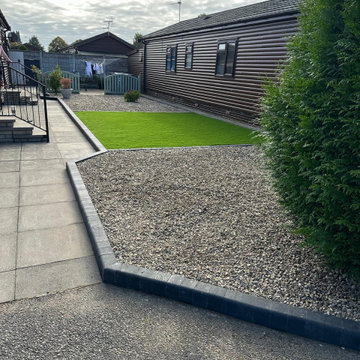 Charcoal Sett Edge Between Shingle and Tarmac