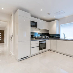 Fitted Sliding Wardrobes and Granite Kitchen Bloomsbury by Inspired Elements - Furniture