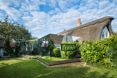 Mirror Pod Extension to Grade II Listed Thatched Cottage