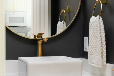 Example of a small minimalist powder room design in Milwaukee with white cabinets, gray walls, a console sink, white countertops and a built-in vanity