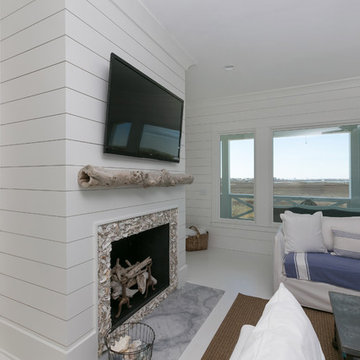 White island White Living Room with Wooden Shiplap Walls Fireplace