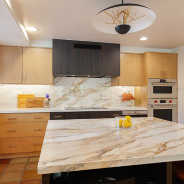 Beautiful large format porcelain counter for the updated kitchen island.