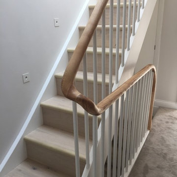 Stylish wooden staircase and railings