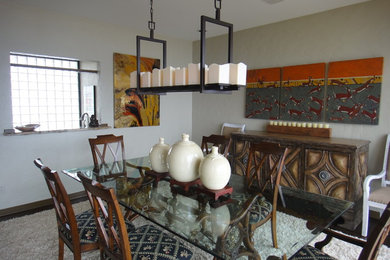 Inspiration for a large eclectic medium tone wood floor great room remodel in Little Rock with beige walls