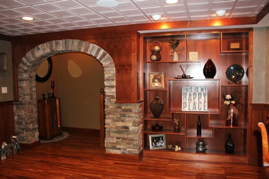 Home theater - large enclosed home theater idea in Boston with beige walls and a projector screen