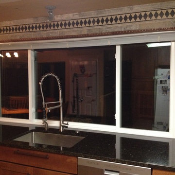 PELLA PREMIUM 3 PANEL SLIDER 1/4 -1/2 - 1/4 OVER GRANITE KITCHEN COUNTER