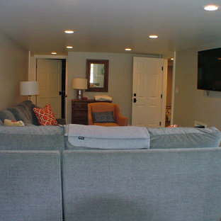 Inspiration for a mid-sized timeless enclosed slate floor home theater remodel in Portland Maine with a wall-mounted tv