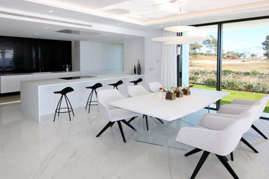 Example of a tuscan dining room design in Malaga