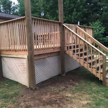 Small deck and decorative pergola; customer request for lattice.