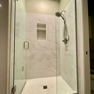 Bright new shower with niche and shower glass in Ahwatukee