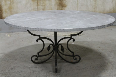 Zinc table top with cast iron base