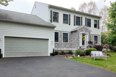 Example of a transitional exterior home design in Boston