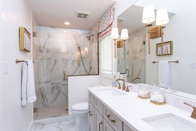Example of a small classic master white tile and porcelain tile white floor and double-sink alcove shower design in Raleigh with shaker cabinets, gray cabinets, an undermount sink, quartz countertops, a hinged shower door, white countertops and a built-in vanity