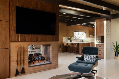 Mid-sized 1960s open concept terra-cotta tile, beige floor, exposed beam and brick wall living room photo in Salt Lake City with a two-sided fireplace, a brick fireplace and a wall-mounted tv