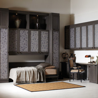 Design ideas for a large contemporary study room in New York with white walls, vinyl floors, a built-in desk, no fireplace and white floor.