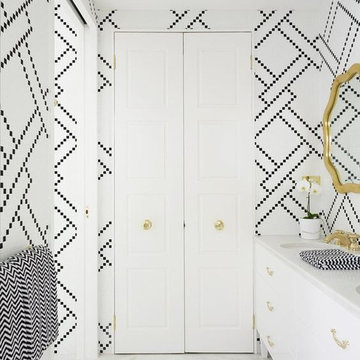 Modern white bathroom with mosaic pattern walls