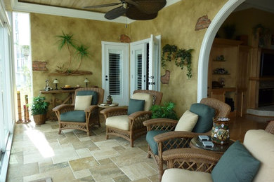 Inspiration for a mid-sized mediterranean home design remodel in Tampa