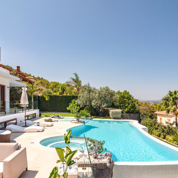 Piscina infintiy con gresite blanco