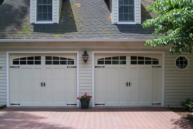Inspiration for a large traditional attached two-car garage in Dallas.